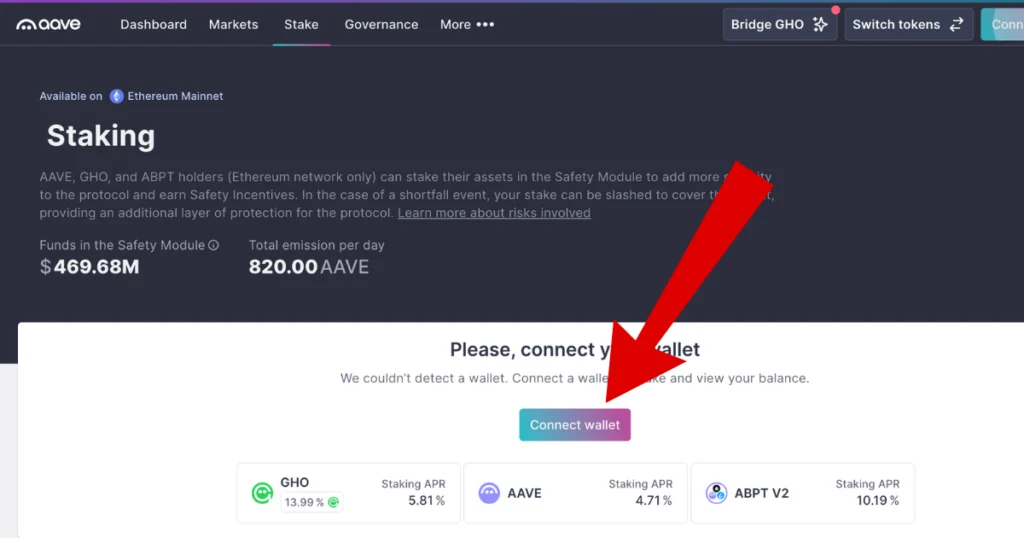 Red arrow pointing to connect wallet on AAVE staking platform